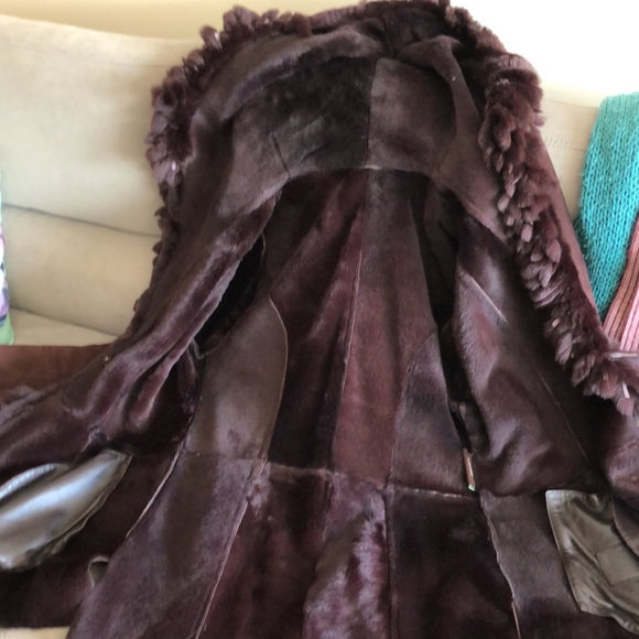 100% Lambs Shearling &rabbit fur trim, purchased @ Nordstrom.Very light but warm - Picture 5 of 13